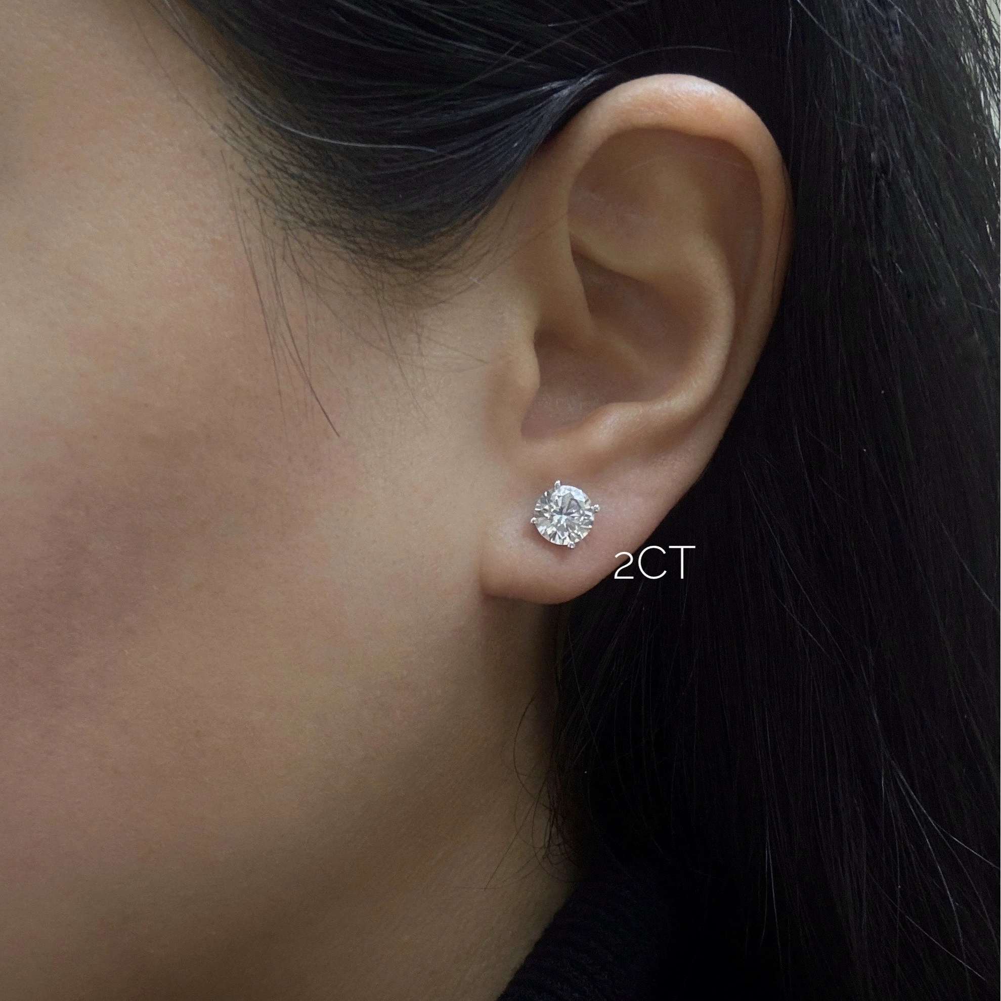 2ct diamond studs on ear