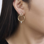 14k yellow gold detachable diamond earrings that can be diamond studs, gold hoops, or diamond pendant on model