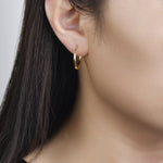 14k yellow gold detachable 14k yellow gold hoops on model