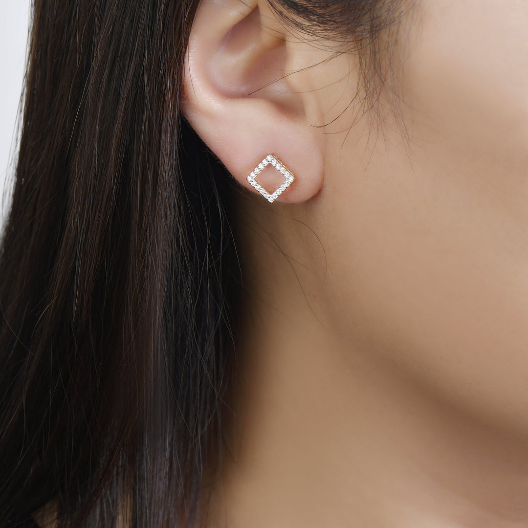 14k yellow gold detachable diamond stud earrings on model