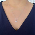 Load image into Gallery viewer, Diamond Evil Eye Pendant in 14k white gold on model