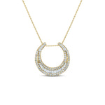 diamond moon shaped necklace in yellow gold with round and baguette diamonds on white background