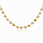 alternating diamond bezels and gold hearts design going 3/4 of the way around in an adjustable necklace in yellow gold