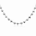 alternating diamond bezels and gold hearts design 