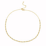 alternating diamond bezels and gold hearts design going 3/4 of the way around in an adjustable necklace in yellow gold