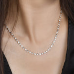 Load image into Gallery viewer, Diamond and Heart Bezel Necklace in 14k white gold on model
