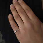 unisex baguette white gold band ring on male model