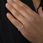 unisex baguette white gold band ring on male model