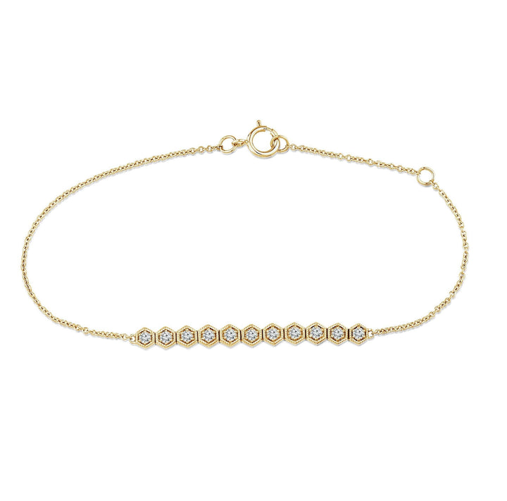 Yellow Gold chain bracelet with a bar of diamonds in a hexagonal setting