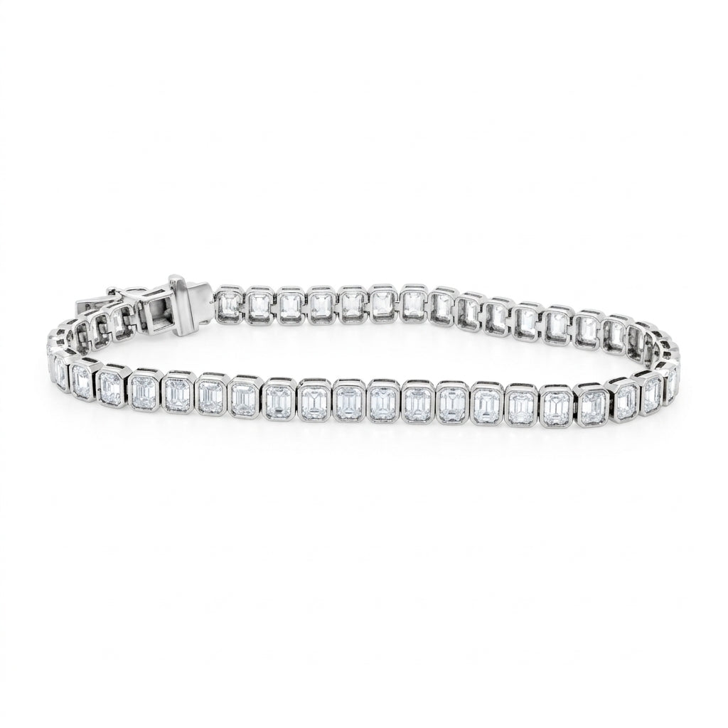 lab grown diamond bezel set bracelet with emerald diamonds in white gold