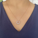 Load image into Gallery viewer, scalloped texture circle pendant with diamonds in 14k rose gold on model