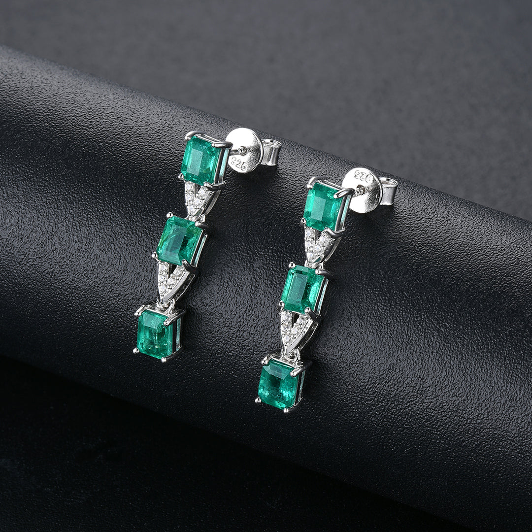 Three Stone Emerald and White Zircon Drop Earrings in Sterling Silver
