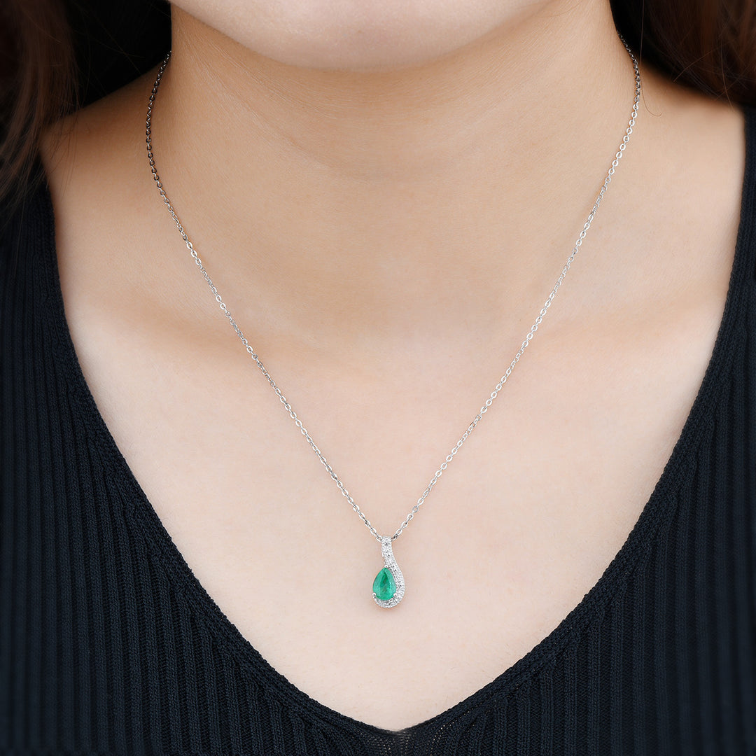Pear Shape Emerald With White Zircon Pendant in Sterling Silver on model