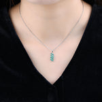 Load image into Gallery viewer, Marquis Emerald With White Zircon Pendant in Sterling Silver on model
