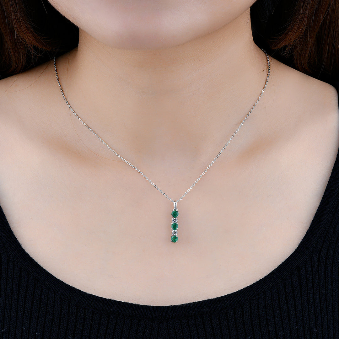 Round Emerald With White Zircon Drop Pendant in Sterling Silver on model