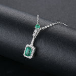 Load image into Gallery viewer, Emerald and White Zircon Drop Pendant in Sterling Silver
