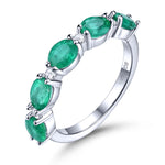 Load image into Gallery viewer, Oval Emerald Half Eternity Ring in Sterling Silver
