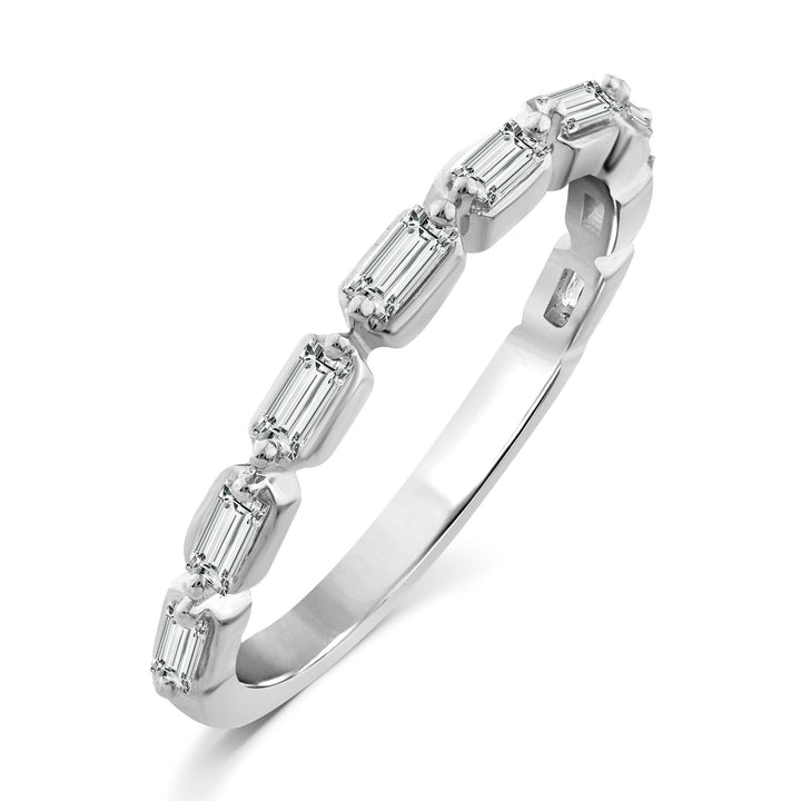 white gold diamond band ring with sideways baguette diamonds set between two prongs going half way eternity