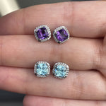 Load image into Gallery viewer, cushion cut amethyst and cushion cut blue topaz with diamond halo stud earrings