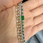 Load image into Gallery viewer, stackable bracelets with emerald and diamond bracelet, diamond tennis bracelet, diamond bezel bracelet in honeycomb bezel, and heart and diamond bracelet in white gold and yellow gold
