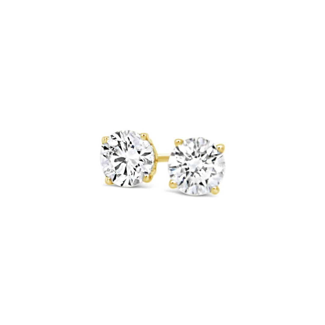 solitaire diamond studs in yellow gold