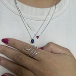 Load image into Gallery viewer, layering necklaces with garnet necklace and sapphire pendant and diamond snake ring
