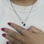 Load image into Gallery viewer, layering necklaces with rhodolite garnet pendant and sapphire pendant and diamond snake ring
