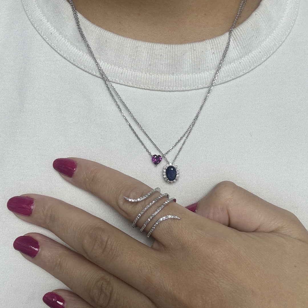 layering necklaces with rhodolite garnet pendant and sapphire pendant and diamond snake ring