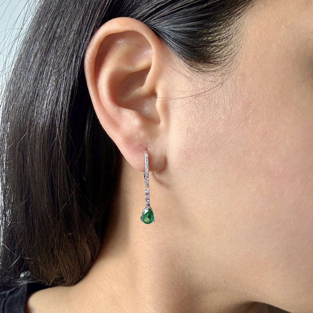 pear shaped emerald dangle earrings with diamonds