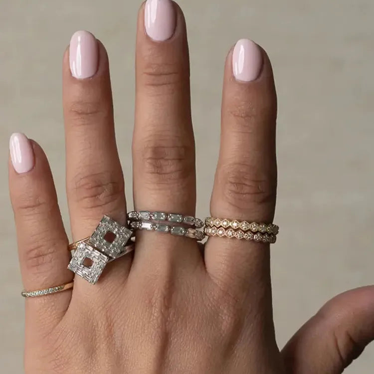 stackable diamond rings in white gold, yellow gold and rose gold. can also be worn as wedding bands. pinky rings. cocktail rings