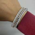 Load image into Gallery viewer, stackable bangles that are silver and cz bangles 
