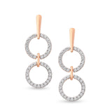 unique jewelry, unique earrings, fashion jewelry, fashion earrings, diamond earrings in rose gold, dangling earrings, dangling diamond earrings, drop earrings, diamond drop earrings, two circle shaped motifs hanging vertically connected in the middle by gold bar. Another gladiator like bar connects motifs to the post.