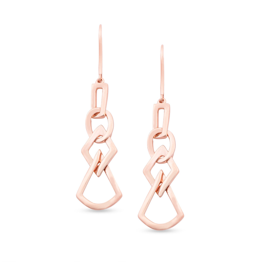 unique jewelry, unique earrings, fashion jewelry, fashion earrings, drop earrings in rose gold, dangling earrings, dangling drop earrings with a design of geometric shapes intertwined with each other. Earrings have a fishhook back. Earrings on model.