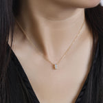 14k yellow gold detachable diamond pendant on model
