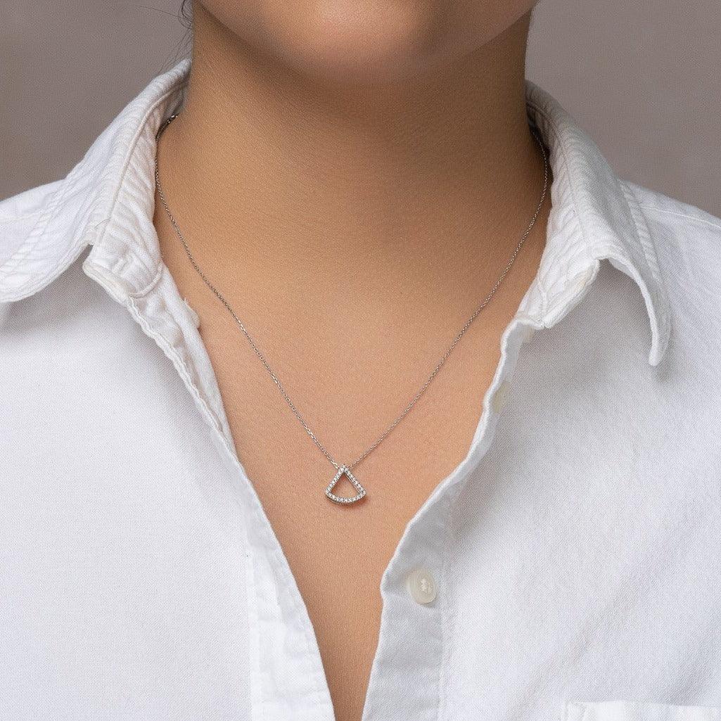 unique jewelry, unique pendant, fashion jewelry, fashion pendant, fashion necklace, diamond pendant in white gold, diamond necklace, fan shaped motif necklace with cable chain in 18in adjustable to 16in, layering necklace. Necklace on model.