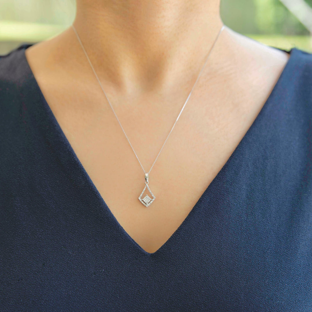 kite shaped necklace with diamonds in white gold